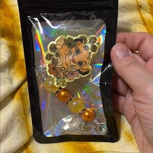 Beaded lion king badge reel